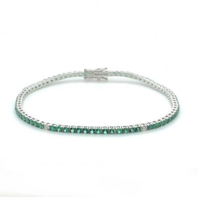Bracciale Tennis in oro bianco, diamanti e smeraldi